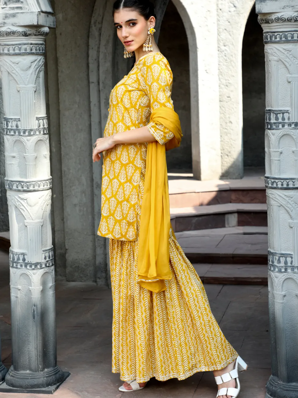 yellow_ethnic_printed_straight_kurta_with_sharara_and_chiffon_dupatta_4.webp Jaipur Kurti Ethnic Printed Straight Kurta With Sharara And Chiffon Dupatta
